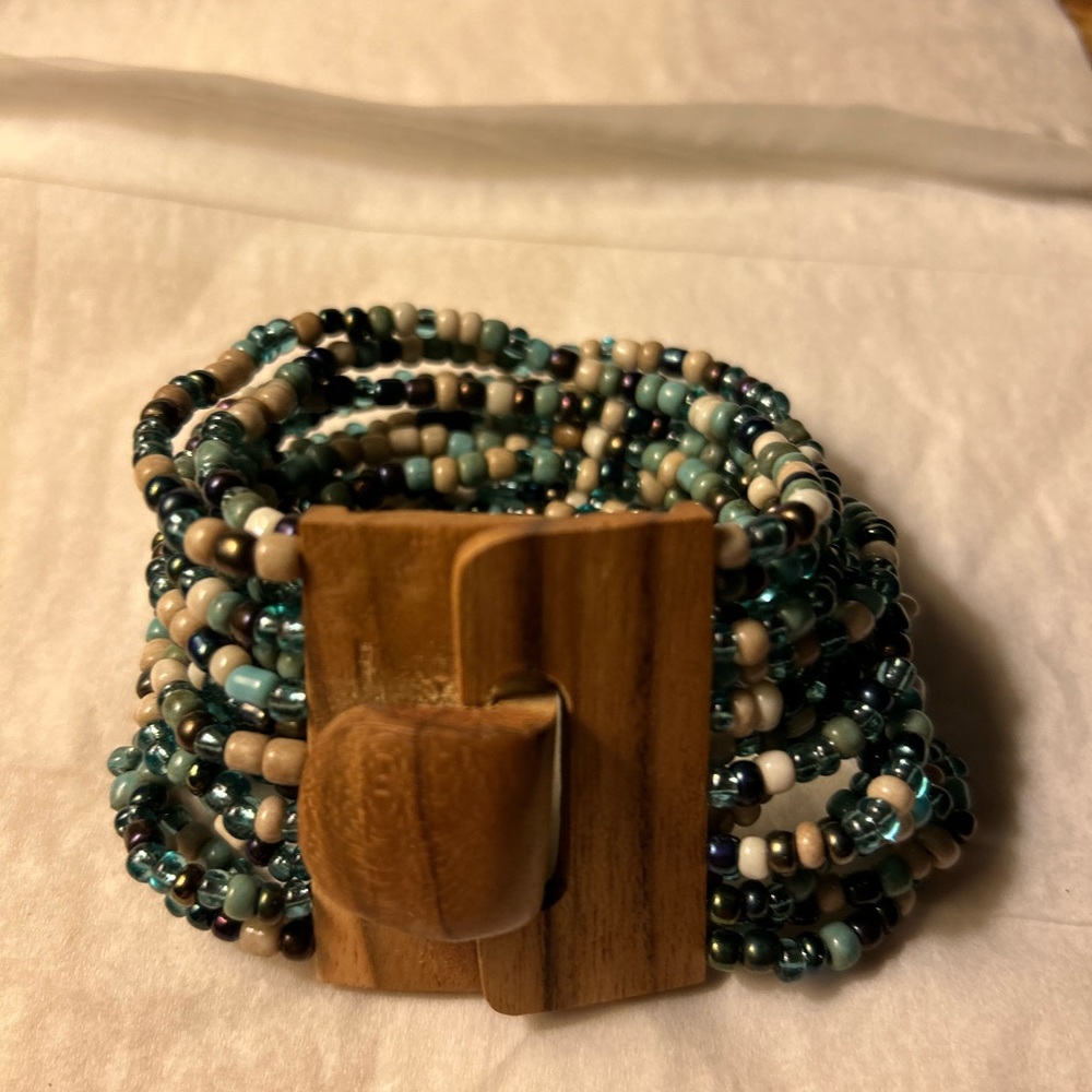 Bead bracelet, multi strand with wood clasp